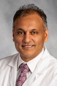 Photo of Dr. Hassan Photo of Dr. Hassan