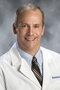 Photo of Dr. Timmis Photo of Dr. Timmis