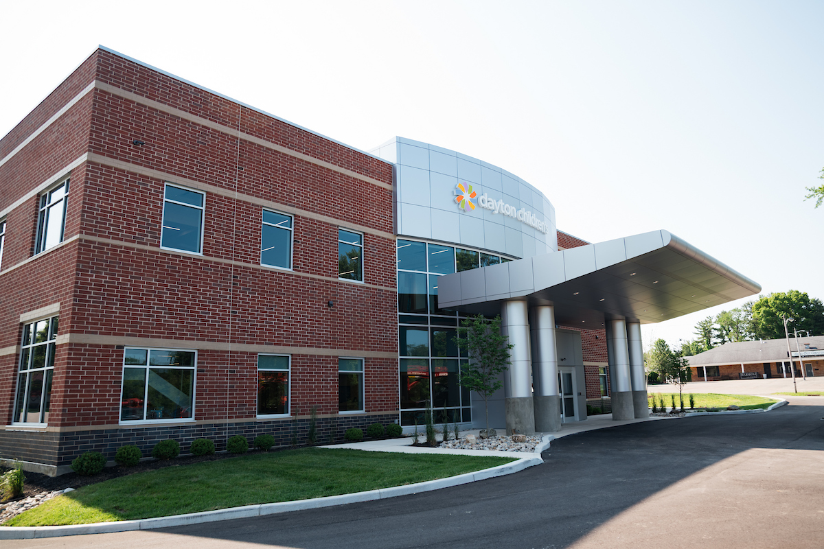 exterior entrance of the two story brick Dayton Children's outpatient care center building