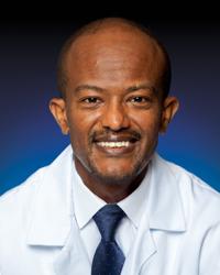 Dr. Micheas Zemedkun, MD