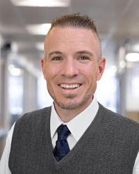Greg E. Halliday